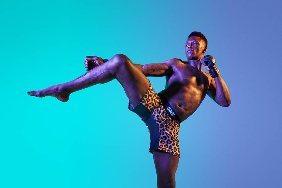 Israel Adesanya Kick Pose Wallpaper