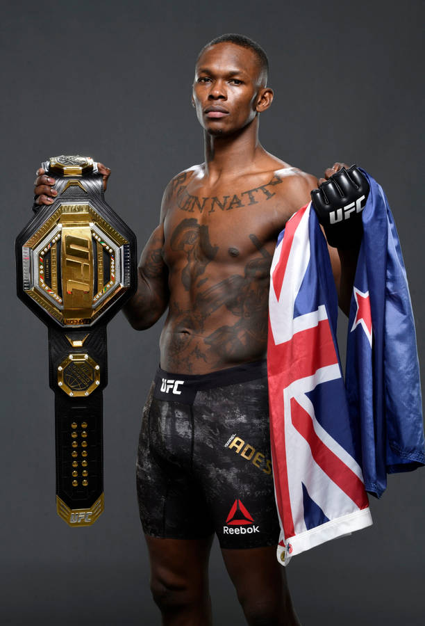 Israel Adesanya With Flag And Belt Wallpaper