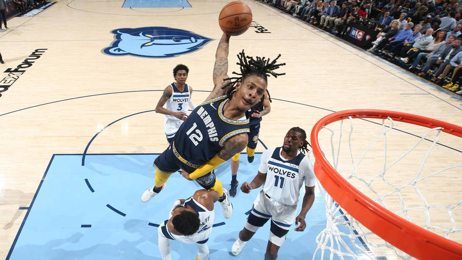 Ja Morant Dunk Playing Against Wolves Wallpaper