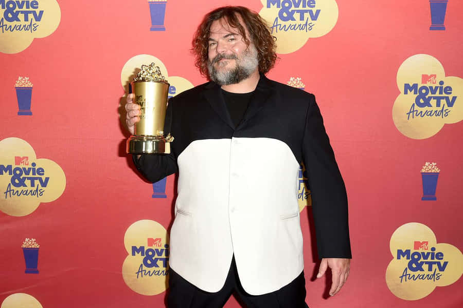 Jack Black Radiating Energy Onstage Wallpaper