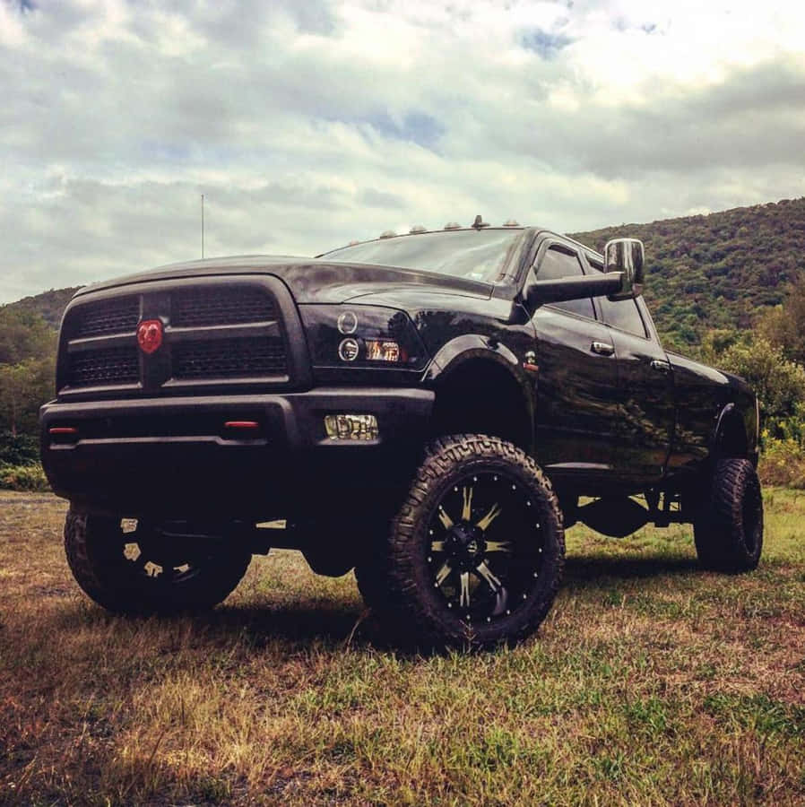 Jacked Up Trucks By The Mountains Wallpaper