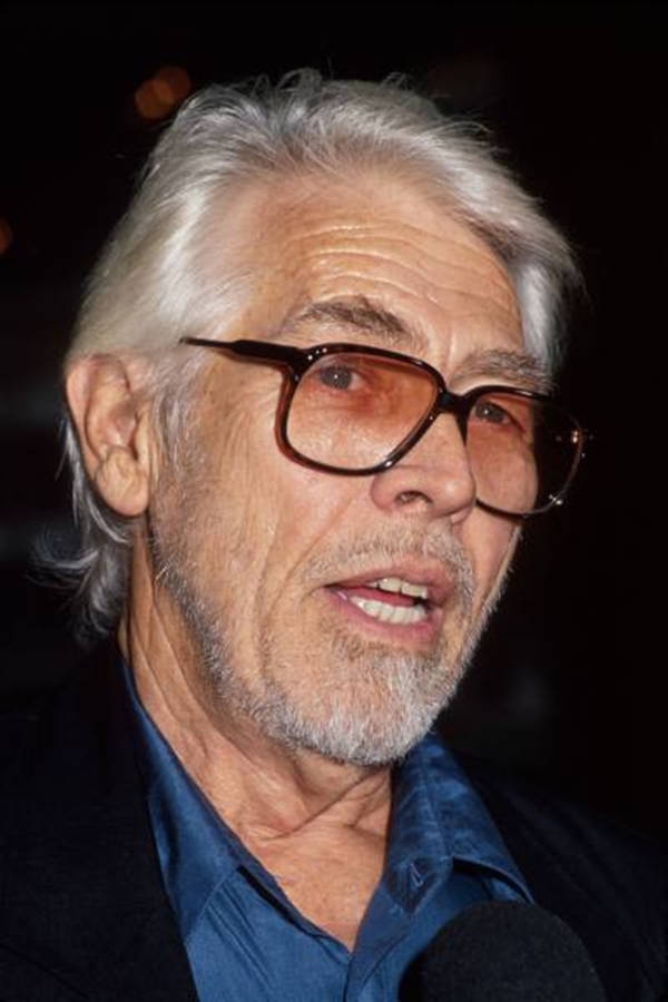 James Coburn With Fashion Sunglasses Wallpaper