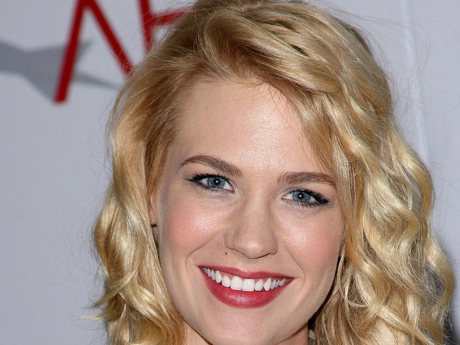 January Jones Sporting Elegant Wavy Curls Wallpaper