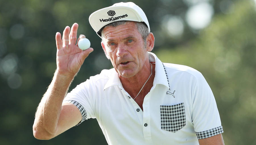 Jesper Parnevik Holding Golf Ball Wallpaper