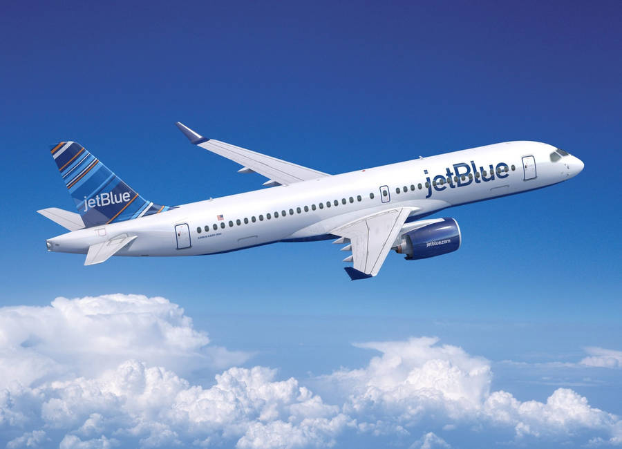 Jetblue Flight On Blue Cloudy Skies Wallpaper