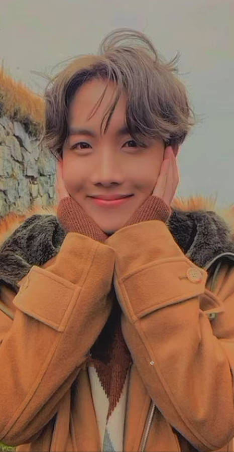 Jhope Cute Smiling In Brown Jacket Wallpaper