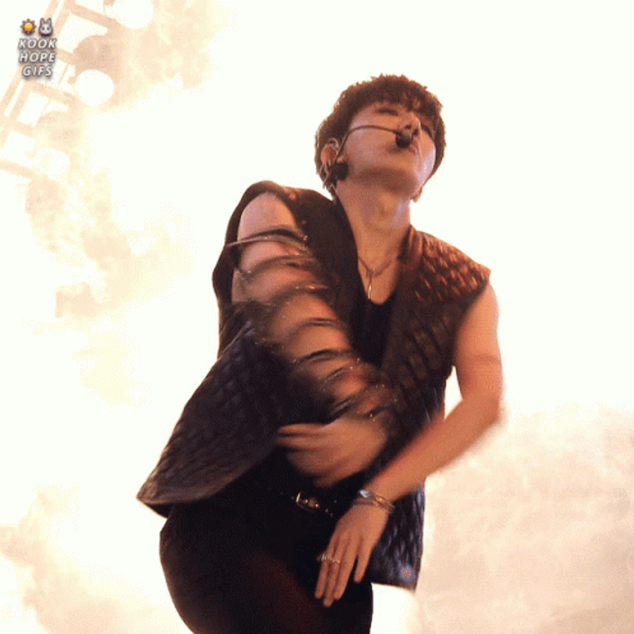 Jhope's Engaging Performance On Stage Wallpaper
