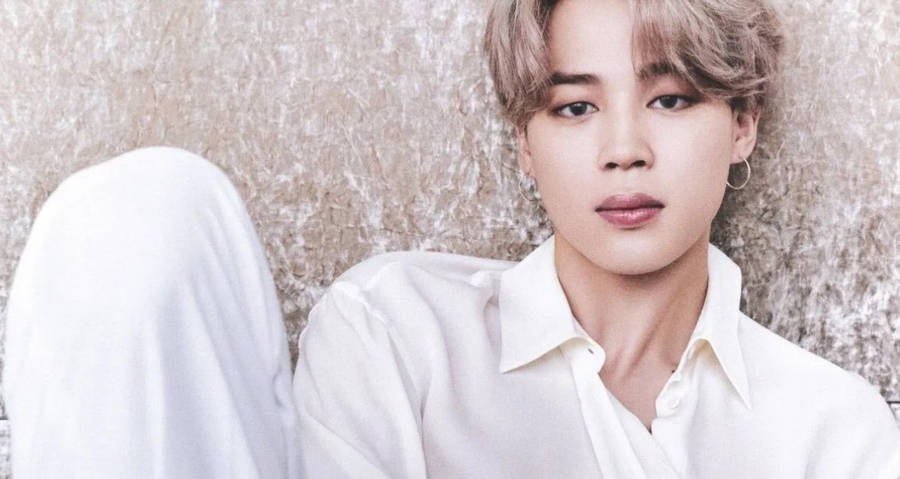 Jimin Of Bts On A Wall Wallpaper