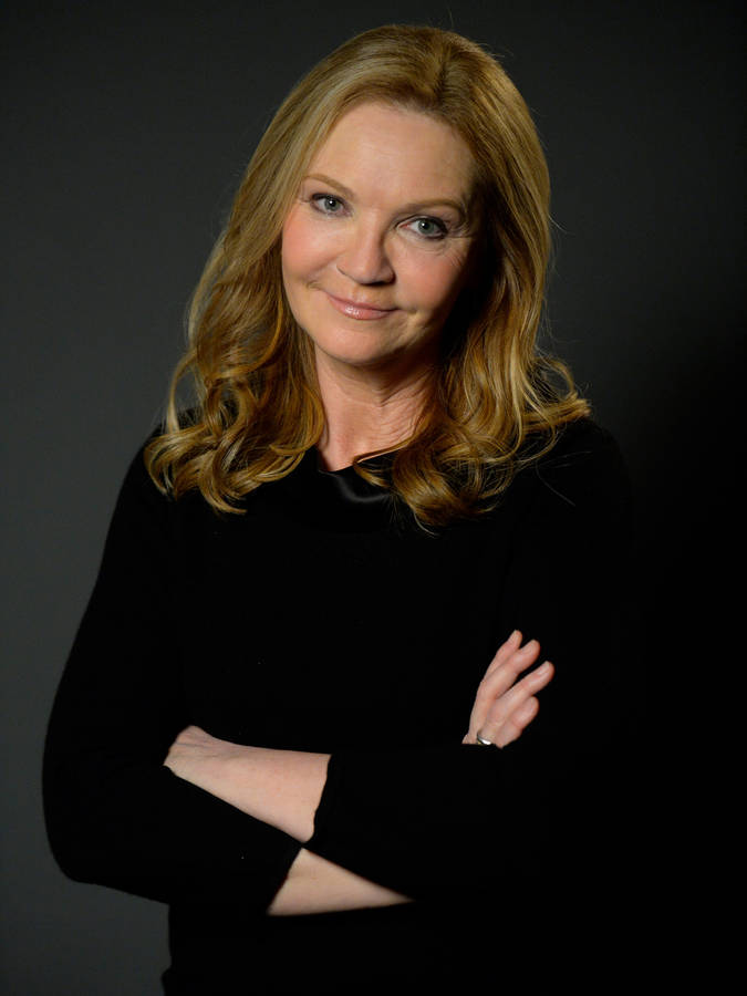 Joan Allen Crossing Arms Wallpaper