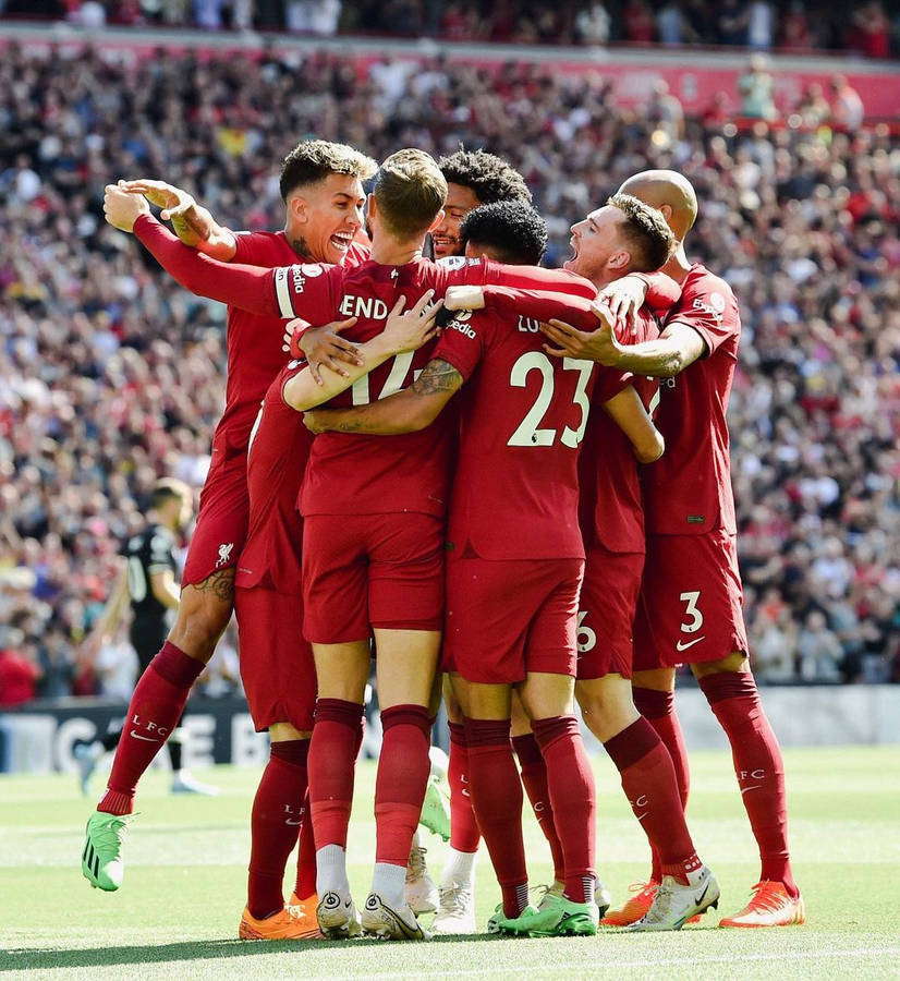 Joe Gomez Liverpool Fc Group Hug Wallpaper