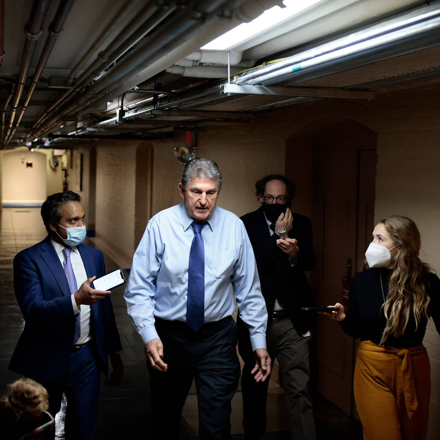 Joe Manchin Being Interviewed In The Basement Wallpaper