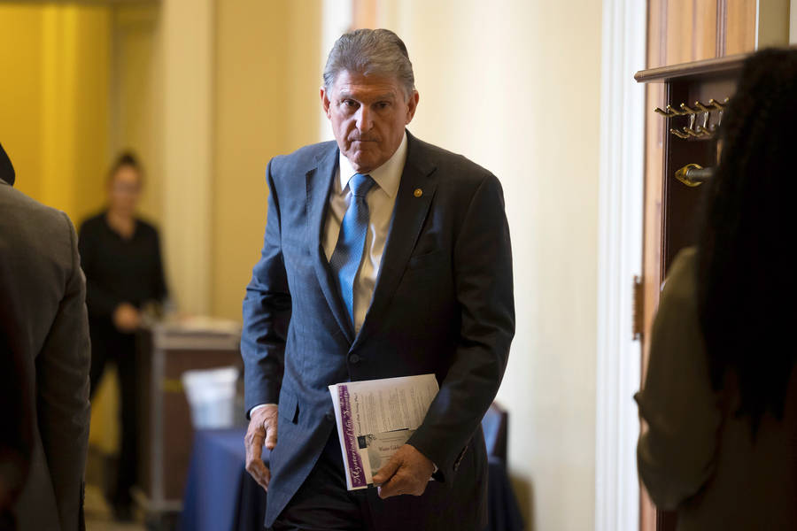 Joe Manchin With Documents Wallpaper