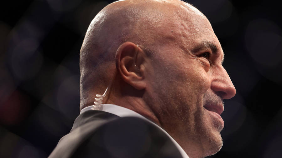 Joe Rogan With Earpiece Wallpaper