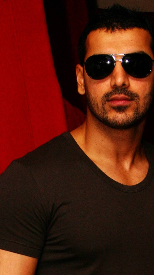 John Abraham With Aviator Glasses Wallpaper