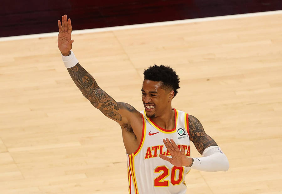 John Collins Waving His Both Hands Wallpaper