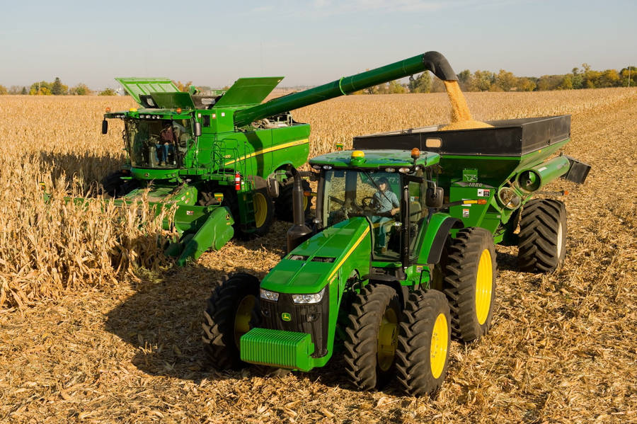 John Deere Harvesting Sunny Day Wallpaper