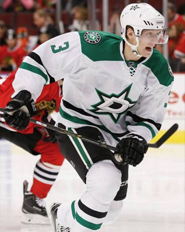 John Klingberg In Action On Ice Wallpaper