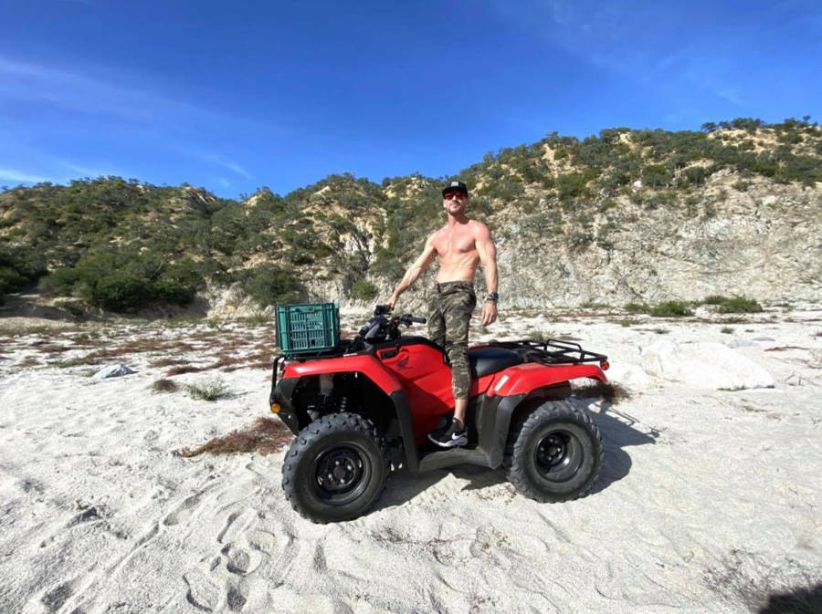 Johnny Sins On Quad Bike Wallpaper