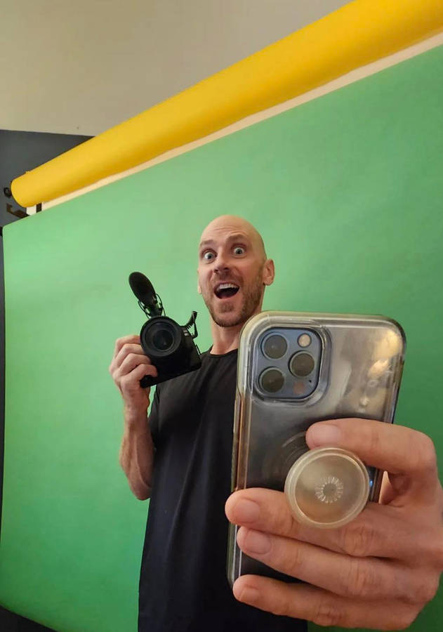 Johnny Sins Showing Off Green Screen Wallpaper