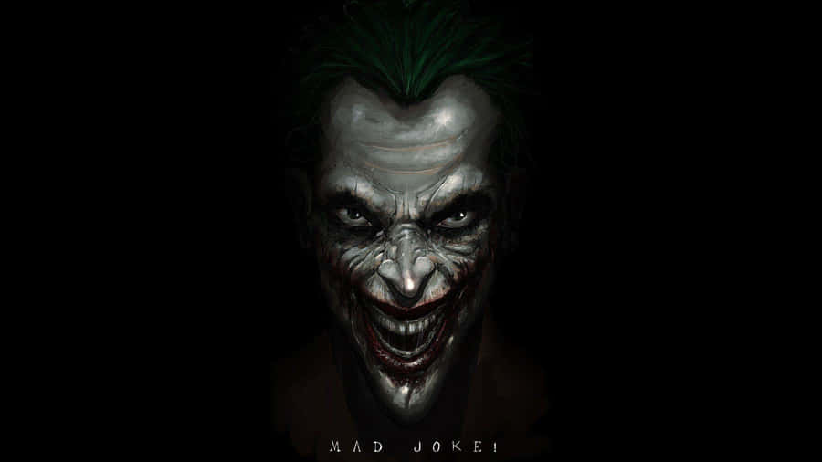 Joker's Maniacal Laughter In The Dark Wallpaper