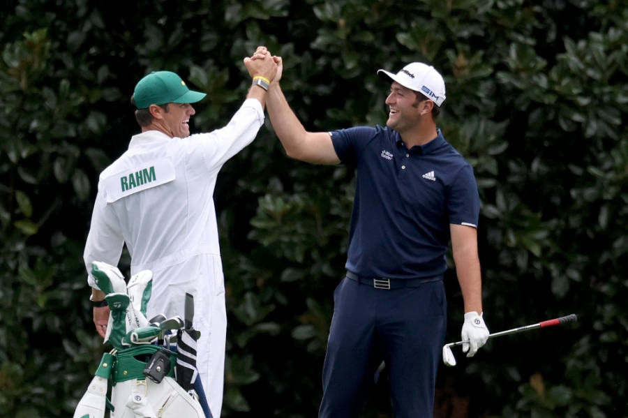 Jon Rahm Handshaking A Caddie Wallpaper