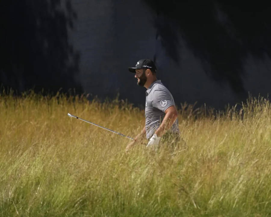 Jon Rahm In The Grasses Wallpaper