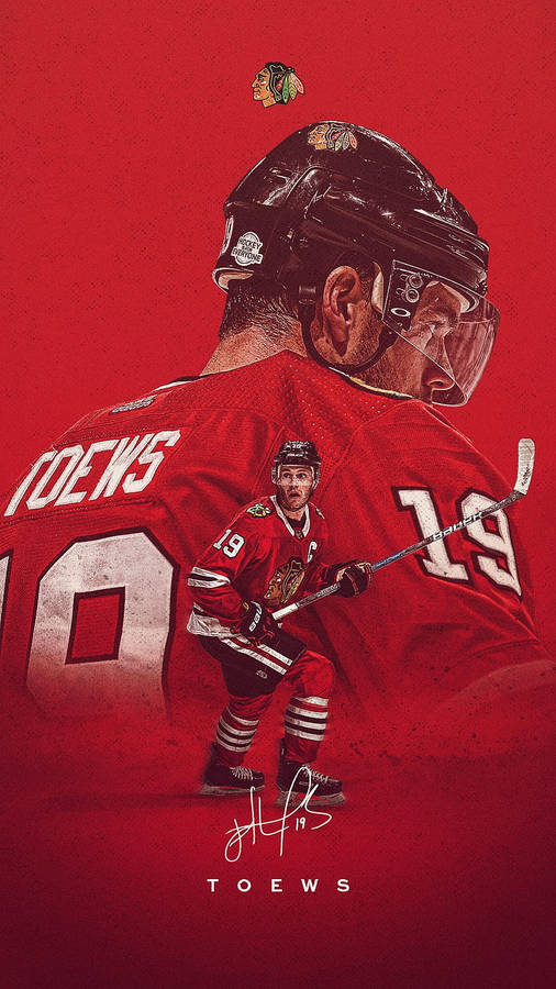 Jonathan Toews, Captain Of The Chicago Blackhawks, In Action Wallpaper