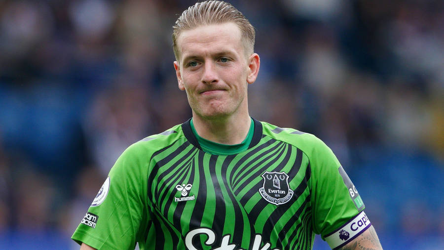 Jordan Pickford Close Up In Green Wallpaper