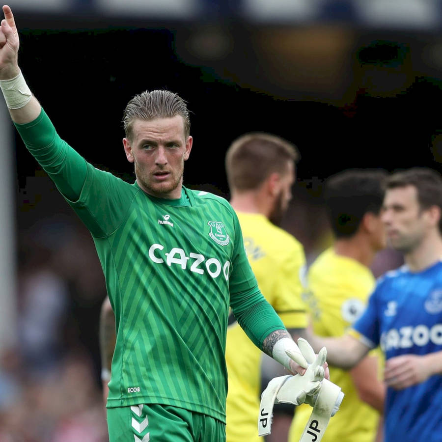 Jordan Pickford Holding His Gloves Wallpaper