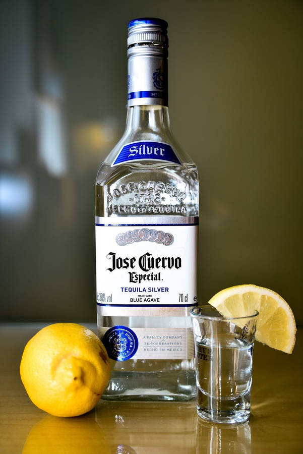 Jose Cuervo Tequila Bottle With Lemon Wallpaper