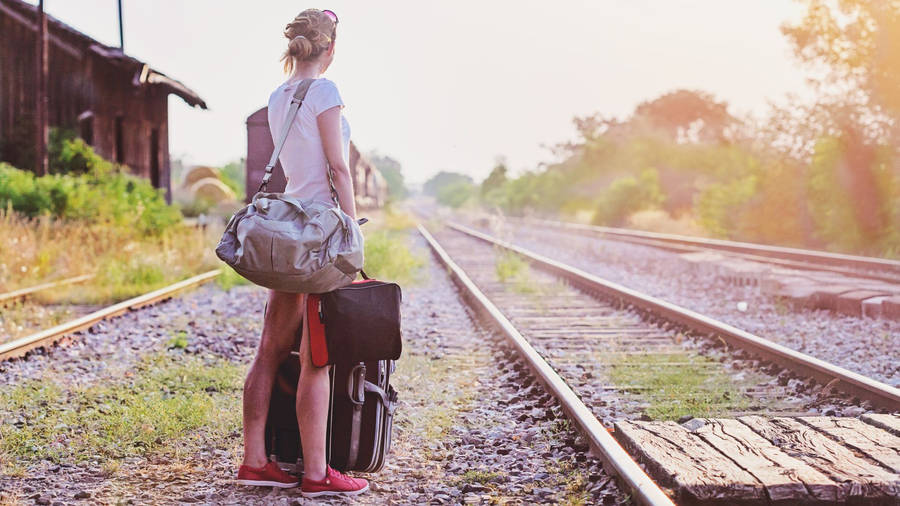 Journey Of A Woman Waiting For Train Wallpaper