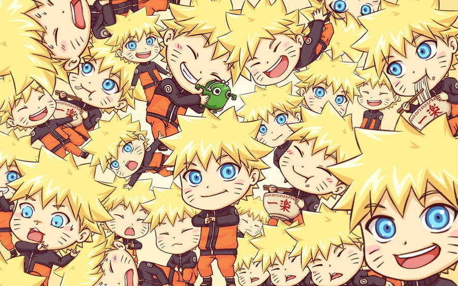 Joyful Chibi Naruto Performing Shadow Clone Jutsu On Laptop Display Wallpaper