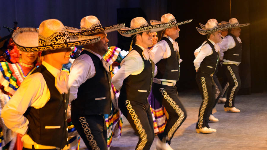 Joyful Mexican Man Dancing Wallpaper