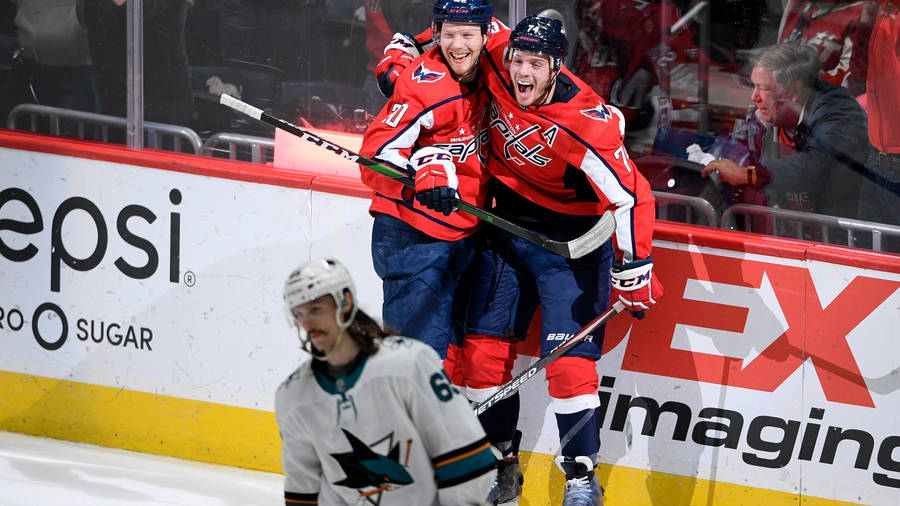 Joyful Washington Capitals John Carlson With Teammate Wallpaper