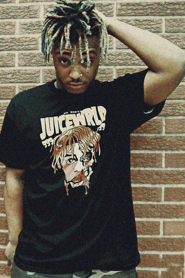 Juice Wrld 999 In Brick Wall Wallpaper