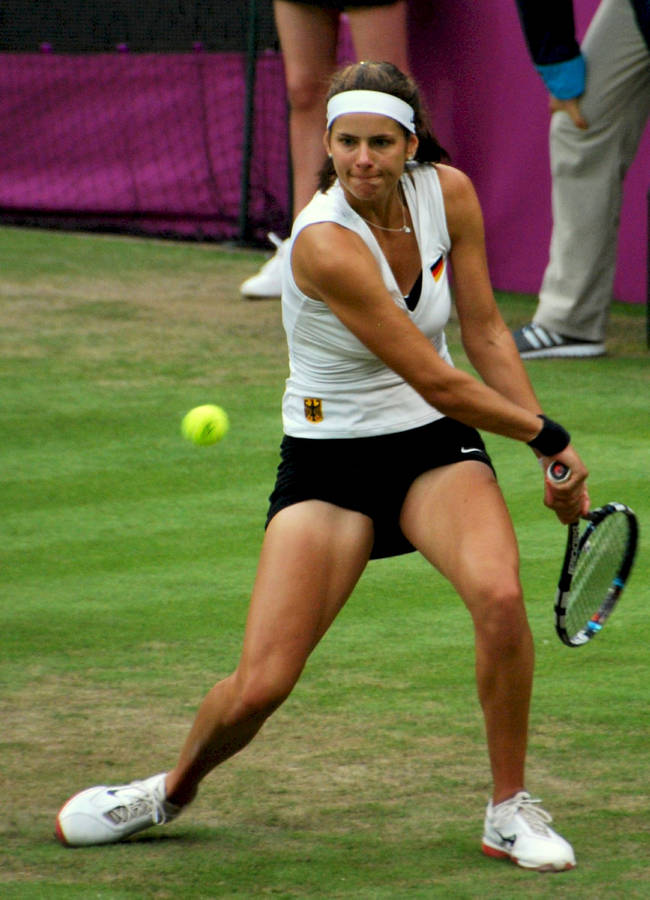 Julia Goerges In Action During A Tennis Match Wallpaper