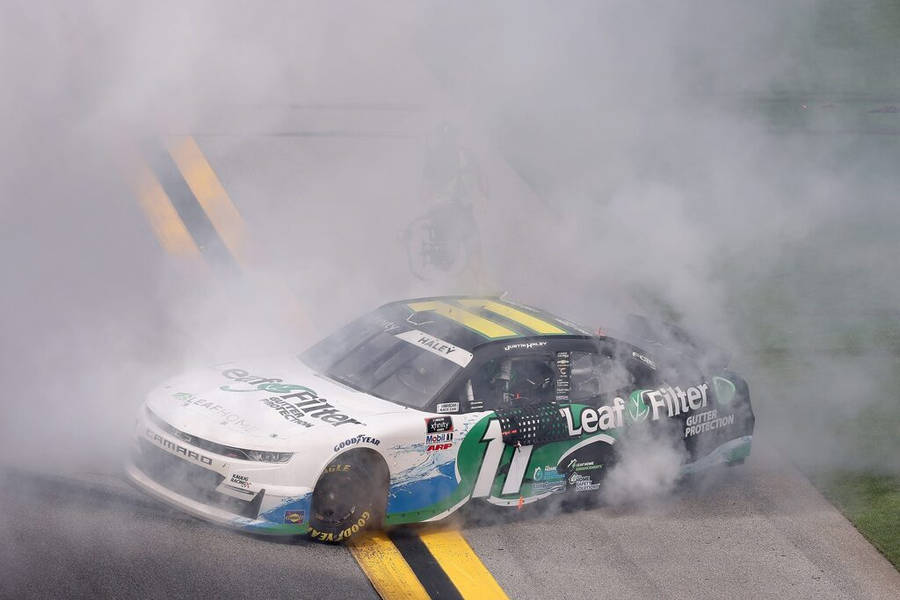 Justin Haley Car Covered In Smoke Wallpaper