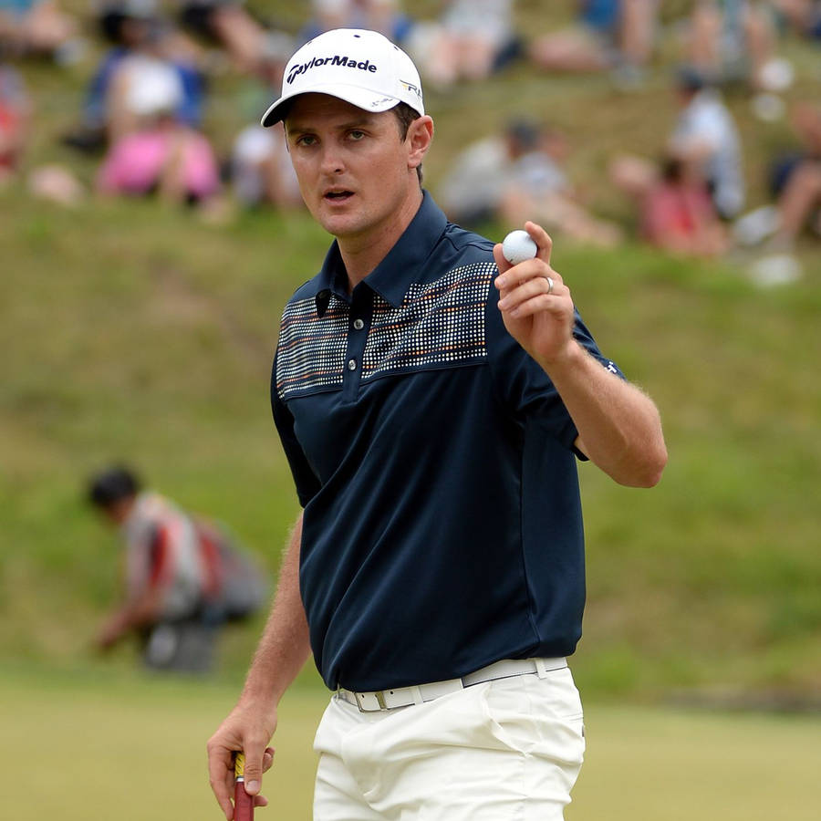 Justin Rose Holding A Golf Ball Wallpaper