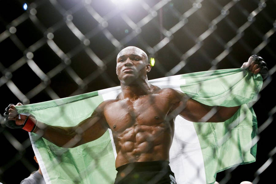 Kamaru Usman Holds Flag Octagon Wallpaper