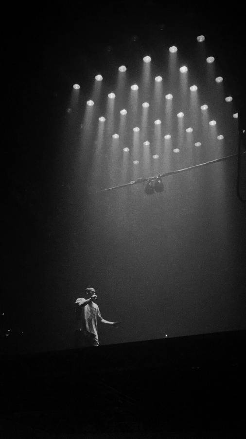 Kanye West Under Clustered Lights Wallpaper