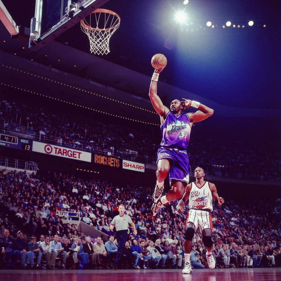 Karl Malone And His Ultimate Signature Slam Dunk Wallpaper