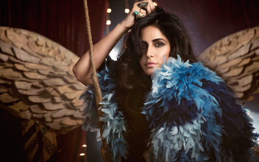 Katrina Kaif In Blue Feather Bolero Wallpaper