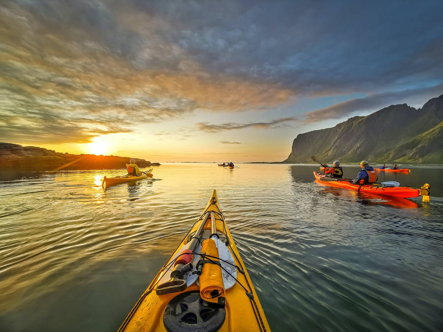 Kayaking At Sunset Wallpaper