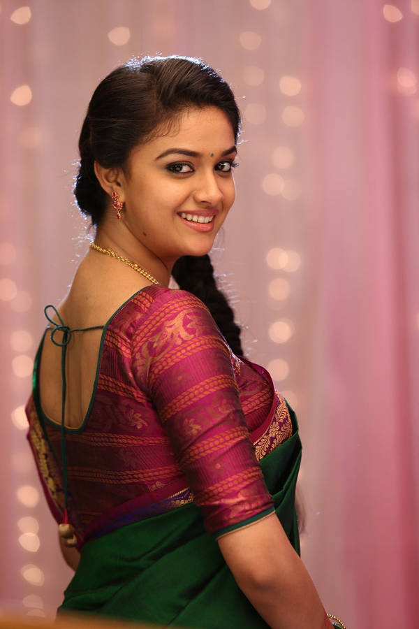 Keerthi Suresh Green And Magenta Wallpaper