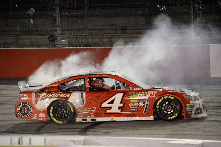 Kevin Harvick’s Race Car In Action Wallpaper