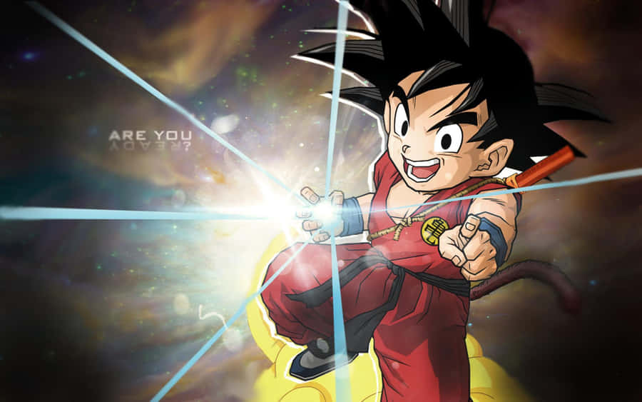 Kid Goku With Light Orb On Hand Wallpaper