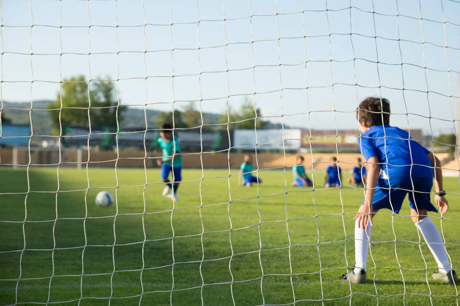 Kids Soccer As Physical Education Wallpaper