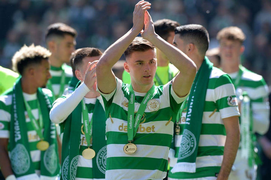 Kieran Tierney Celebrating Victory With Team And Medals Wallpaper