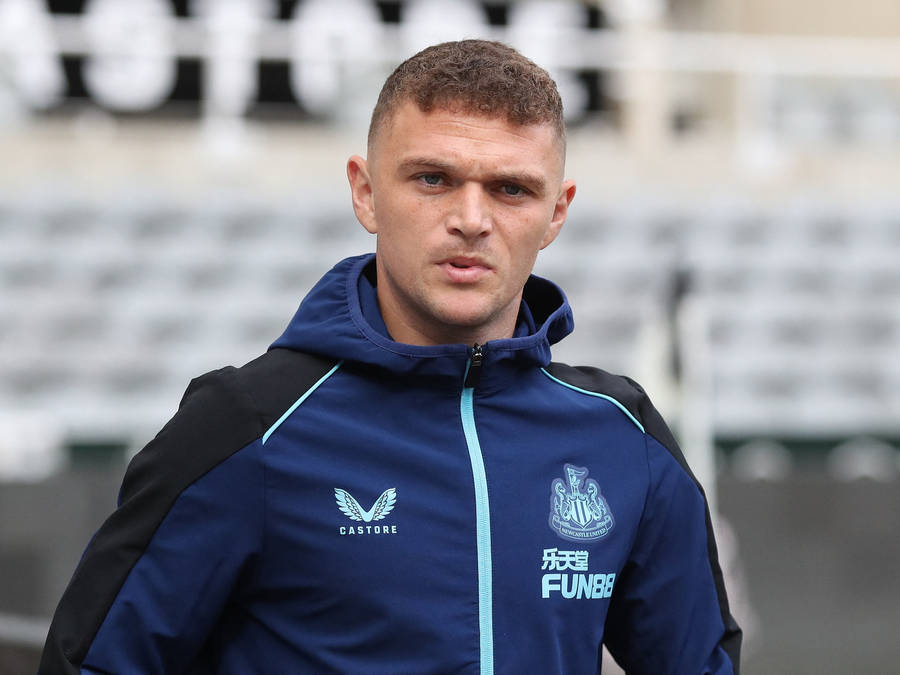 Kieran Trippier Posing In A Blue Windbreaker Wallpaper