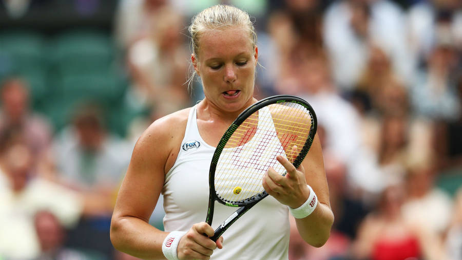 Kiki Bertens Touching Racket Wallpaper